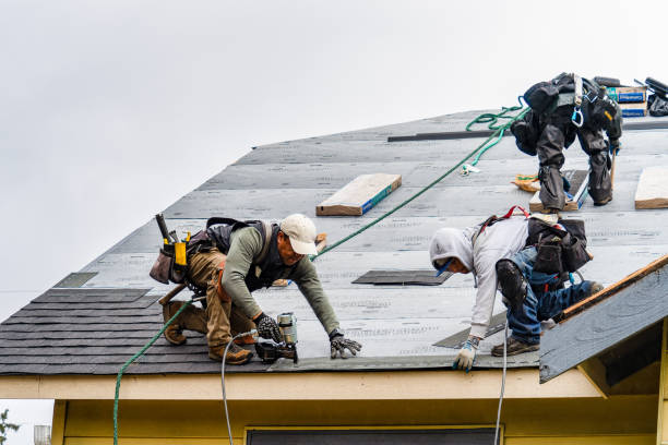Professional Roofing technician working in Hankins, NY
